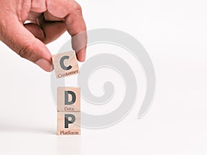 Concept of Customer Data Platform on wooden cubes.