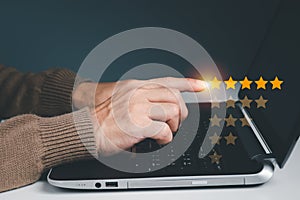 The concept is customer evaluation with five-star good rating feedback. clients satisfaction and positive review experience with