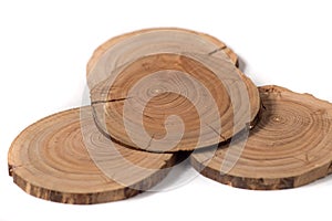 The Concept dendrochronology. tree trunks clearly visible annual rings, round slices of trees, white background photo