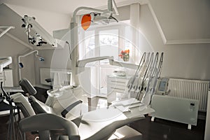 Concept of dental. stomatology concept - interior of new modern dental clinic office with chair.. Dental equipment