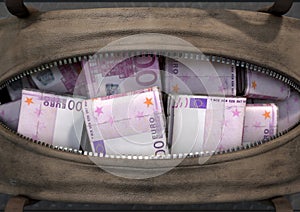 Illicit Cash In A Brown Duffel Bag photo