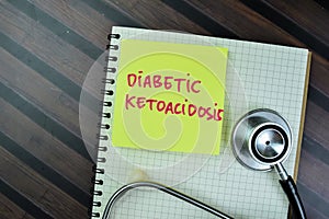 Concept of Diabetic Ketoacidosis write on sticky notes isolated on Wooden Table