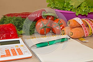 Concept diet and weight loss on wooden table. Low-calorie vegetables diet. Diet for weight loss