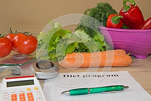 Concept diet and weight loss on wooden table. Low-calorie vegetables diet. Diet for weight loss