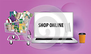 Concept of Digital marketing and marketplace,shopping cart and laptop with word Shop online