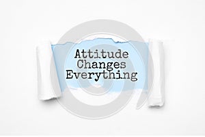Concept of discovering Attitude Changes Everything. Uncovered unrolled beige torn paper and search engine optimization
