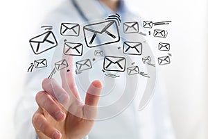 Concept of Doctor touching email icon on technology interface