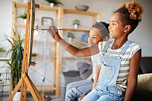 Concept of early childhood education, painting, talent, happy kids