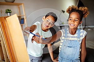 Concept of early childhood education, painting, talent, happy kids