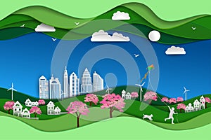 Concept of eco friendly and save the environment with green nature landscape paper art scene background