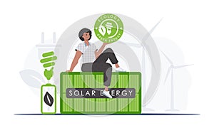 The concept of ecology and green energy. The guy sits on the solar panel and holds the ECO logo in his hands. Vector