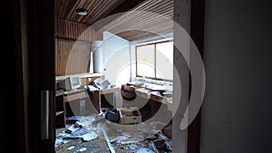 Concept of economic crisis and war. Abandoned building interior, smooth move camera