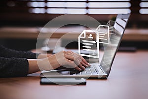 Concept of electronic signature. Woman working on laptop at table, closeup