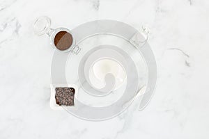 Concept with Empty Coffee Cup, Sugar, Ground Coffee and Beans