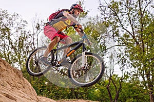 The concept of extreme cycling, a mountain bike jump.