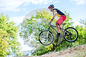 The concept of extreme cycling, a mountain bike jump.