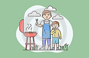 Concept Of Family Spending Time. Happy Father And Son Making Grill Outdoors Together. People Fry Sausages, Communicate