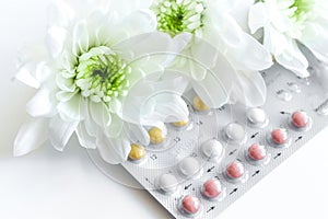 Concept of female contraception on white background