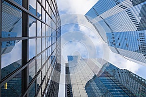 Concept of financial economics future. Business offices skyscrapers on blue sky background photo