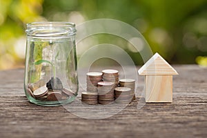 The concept of financial savings to buy a house.