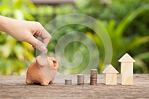 The concept of financial savings to buy a house.