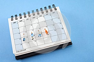 Concept of four-day work week. Printed calendar for a 4 day working week