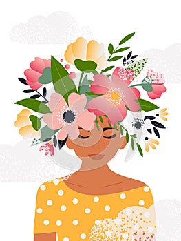 The concept of a free and positive mind, a blooming brain. Portrait of a beautiful woman with flowers on her head