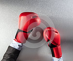 Concept of frustration or office competition for boxing businessman