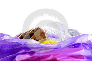 Concept of garbage and pollution. A pile of trash, crumpled plastic cup, packages, paper isolate on a white background