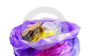 Concept of garbage and pollution. A pile of trash, crumpled plastic cup, packages, paper isolate on a white background