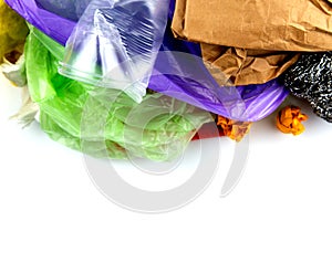 Concept of garbage and pollution. A pile of trash, crumpled plastic cup, packages, paper isolate on a white background