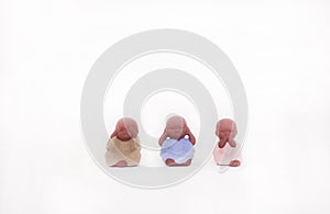 Three toys of babies gesture feeling of  no seeing , hearing and speaking photo