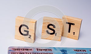 Concept of GST with indian PAN Card on isolated background