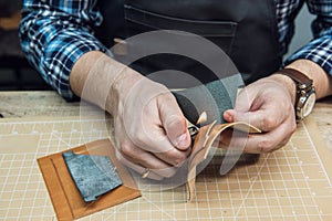 Concept of handmade craft production of leather goods.