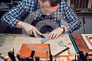 Concept of handmade craft production of leather goods.