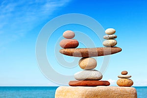 Concept of harmony and balance. Balance stones against the sea.