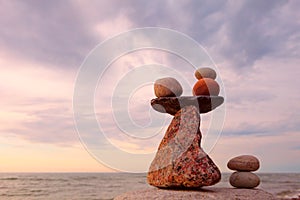 Concept of harmony and balance. Balance stones against the sea