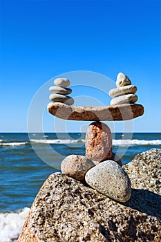 Concept of harmony and balance. Balance stones against the sea.