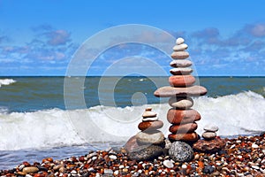 Concept of harmony and balance. Rock Zen near the sea. Balance and poise stones against the sea