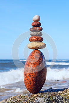 Concept of harmony and balance. Rock Zen on the storm background