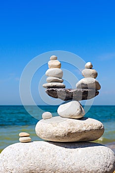 Concept of harmony and balance. Balance stones against the sea