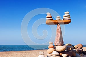 Concept of harmony and balance. Balance stones against the sea.