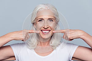 Concept of having strong healthy straight white teeth at old age