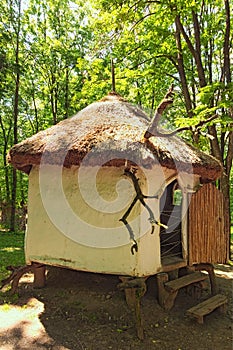 Concept of historical buildings of ancient Ukraine. Small house where healers kept their medicinal herbs photo