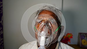 Concept home quarantine, prevention COVID-19 or Coronavirus outbreak situation. Aged man suffering from Covid 19 disease