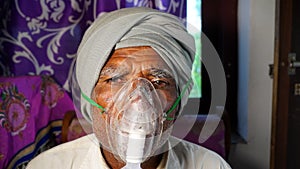 Concept home quarantine, prevention COVID-19 or Coronavirus outbreak situation. Aged man suffering from Covid 19 disease