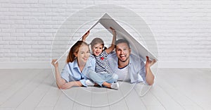 Concept housing young family. Mother father and child in new h