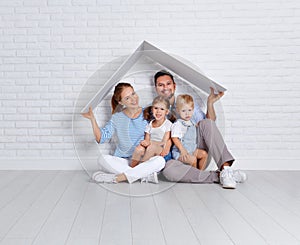 Concept housing a young family. mother father and children in n