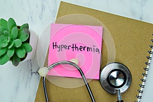 Concept of Hyperthermia write on sticky notes isolated on Wooden Table