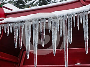 Icicles On A Red Sler. Generative AI